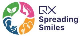 Logo for Spreading Smiles and QX, featuring a multicolor circular symbol with four arc segments (green, pink, blue, orange) and a leaf, next to the text 'Spreading Smiles.'